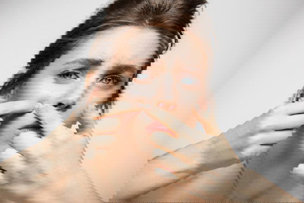 Young Brunette Girl Displeased Her Problem Acne Face Skin White Background Health Cosmetology Skincare 176420 14050 1