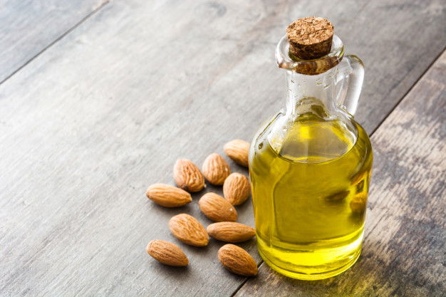 Almond Oil Bottle Wooden Table 123827 13462