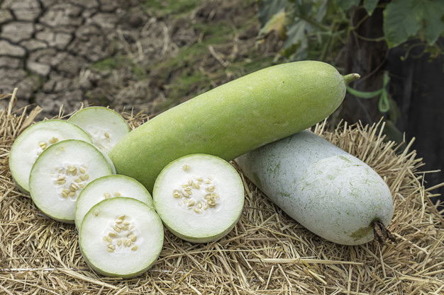 Winter Melon Is Cut Into Pieces On The Straw. Winter Melon Is Cut Into Pieces Straw 53526 548