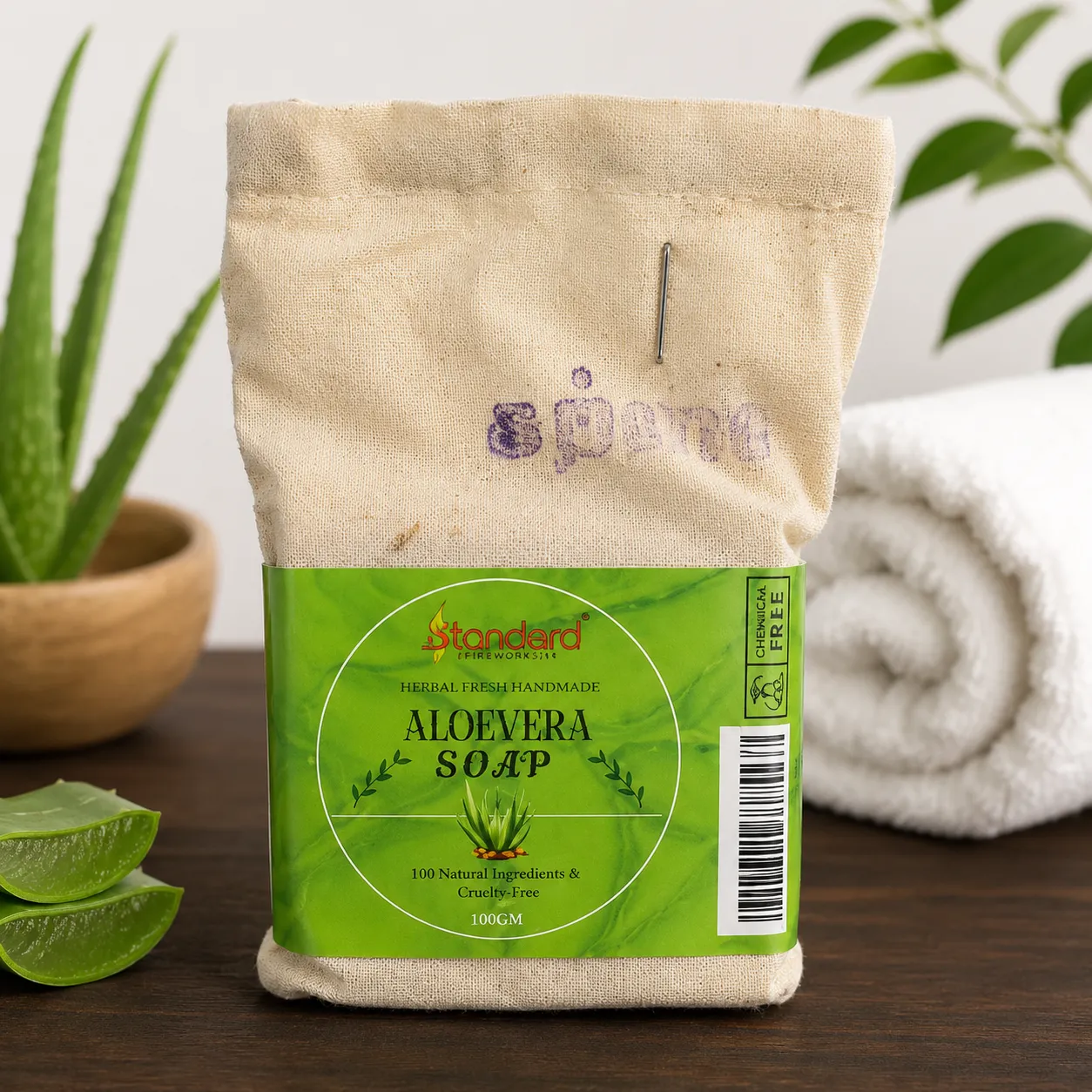 Herbal handmade aloe vera soap in eco-friendly cloth packaging with aloe vera slices and natural background
