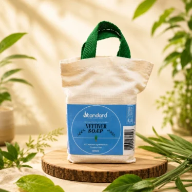 Natural handmade Vetiver soap product advertisement with eco-friendly packaging, herbal roots, and organic skincare background.