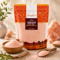Premium Himalayan Nice Salt Pouch Displayed With Wooden Bowls Of Pink Salt Crystals And Himalayan Rock Salt Background.
