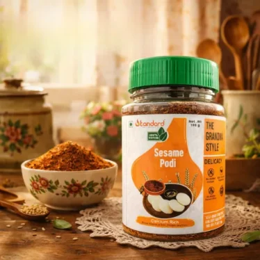 Sesame podi idli podi traditional South Indian spice powder in jar with serving bowl