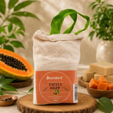 Natural papaya soap skincare banner featuring a woman using soap with papaya extract and herbal bath care benefits.