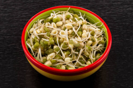 Pea Seeds With Sprouts In Bowl Close Up Macro Shot Top View