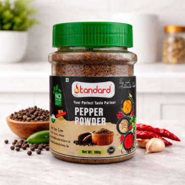 Pepper powder 100g jar with kitchen background and spices for Indian cooking