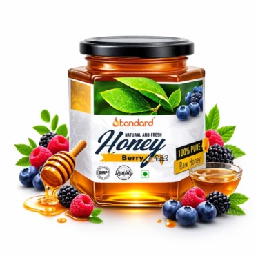 Standard berry honey raw natural honey jar with fresh berries, honey dipper, and 100 percent pure raw honey label on white background
