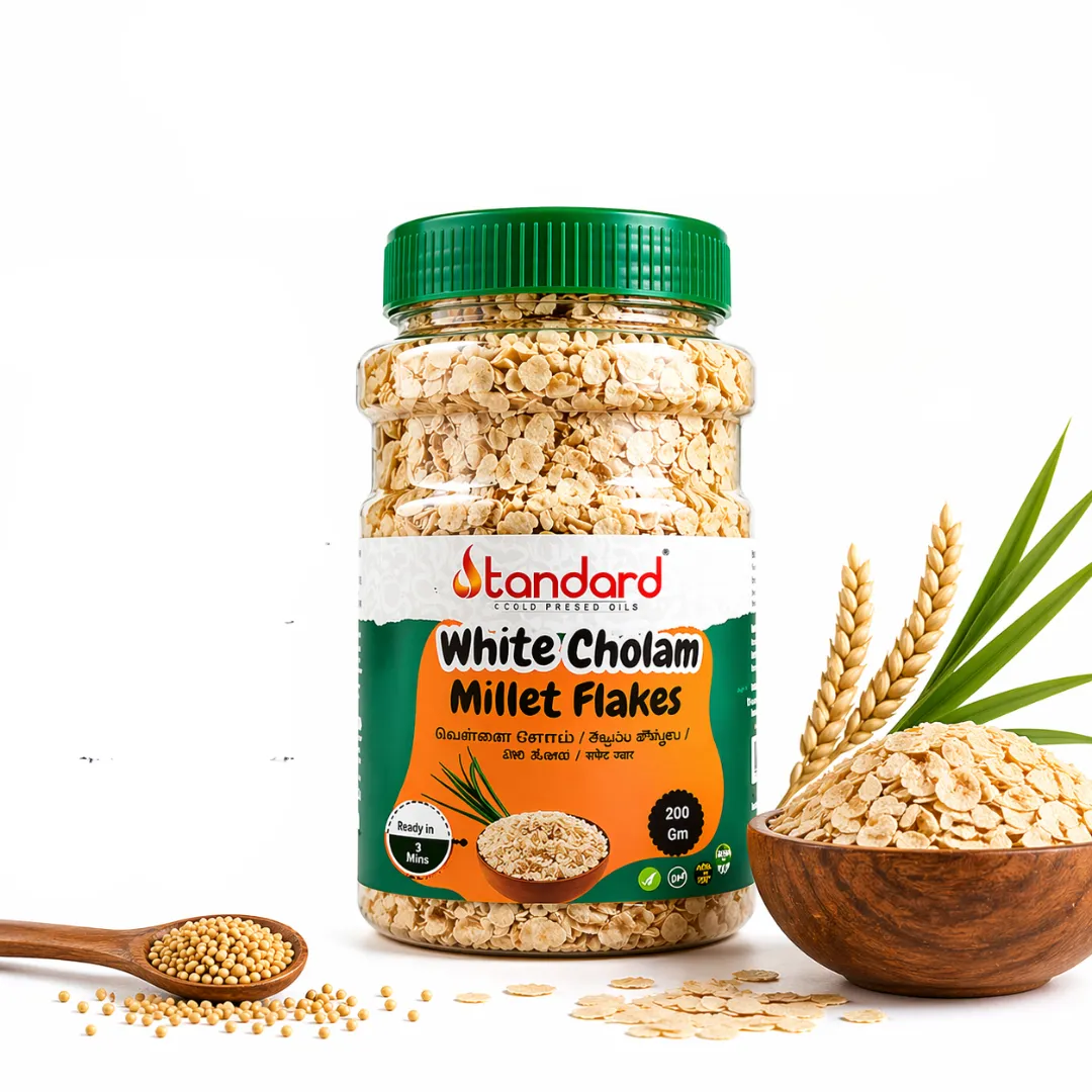 White cholam millet flakes jar with wooden bowl and grains healthy natural Indian breakfast food