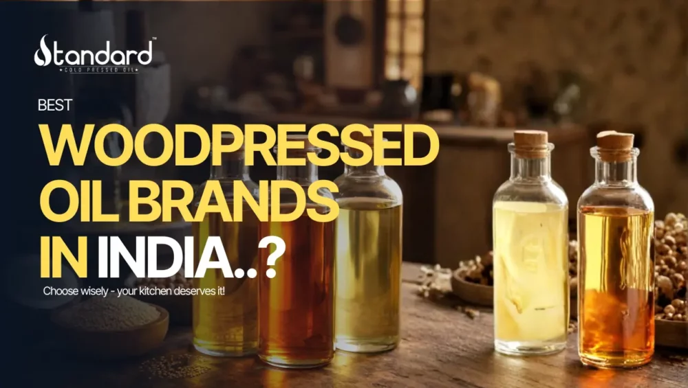 Best Wood Pressed Oil Brands In India Displayed In Glass Bottles With Rustic Kitchen Background, Highlighting Pure Traditional Cold Pressed Oils.