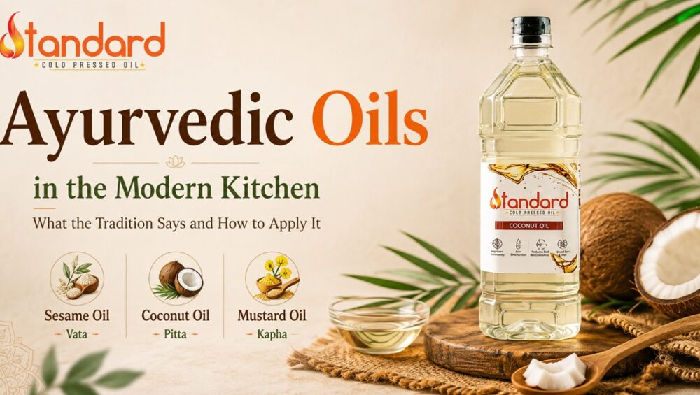 Ayurvedic Oils In The Modern Kitchen: What The Tradition Says And How To Apply It 9 Standard Cold Pressed Oil Ayurvedic Cooking Oil Banner Featuring A Bottle Of Standard Cold Pressed Coconut Oil Alongside Fresh Coconut, With Illustrations Representing Sesame Oil For Vata, Coconut Oil For Pitta, And Mustard Oil For Kapha, Highlighting Traditional Ayurvedic Oil Choices For The Modern Kitchen.