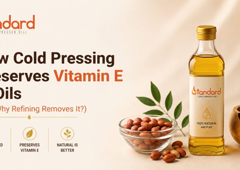 How Cold Pressing Preserves Vitamin E In Oils (And Why Refining Removes It)? 1 Standard Cold Pressed Oil Bottle With Peanuts And Leaves, Illustrating How Cold Pressing Helps Preserve Vitamin E In Oils.